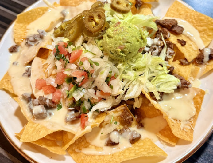El Rey Tacos & Beer signature dishes BurritoNachosRice Bowl